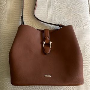 Chaps bucket bag with silver toned hardware.